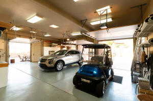 Garage featuring a garage door opener