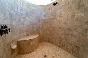 Full bath with a tile shower