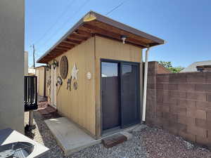 Shed with storage and laundry hookups