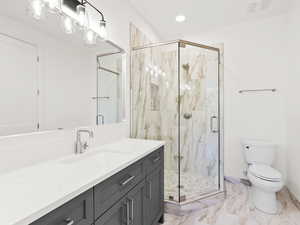 Bathroom featuring vanity, a marble finish shower, light marble finish floors, and recessed lighting