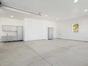 Garage featuring recessed lighting