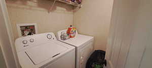 Laundry room featuring washing machine and dryer
