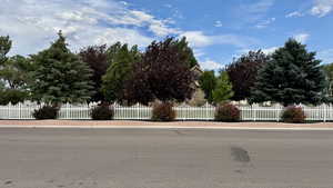 View of front facade with a fenced front yard