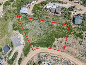 Aerial overview of property's location featuring property parcel outlined