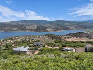 View of mountain background with a nearby body of water