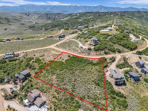 View of rural area featuring property boundaries highlighted and a mountainous background