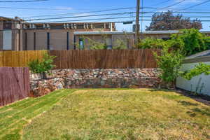 Fully-fenced backyard.