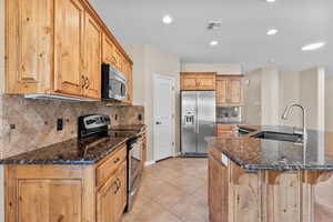 Granite counter tops, tile backsplash & all stainless steel appliances included