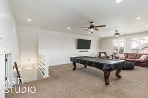 Rec room featuring carpet flooring, a wainscoted wall, recessed lighting, billiards table, and ceiling fan