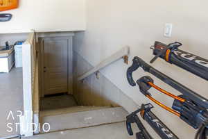 Stairs featuring concrete floors