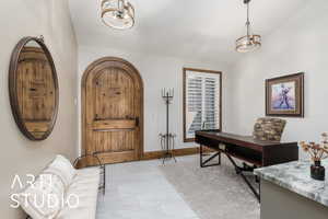 Entrance foyer featuring light marble finish flooring and baseboards