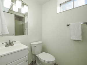 Full bath with vanity and a shower