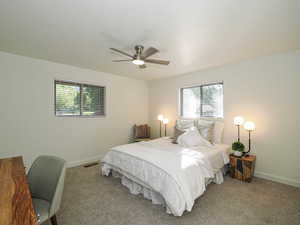 Bedroom featuring carpet flooring and a ceiling fan