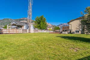 View of yard with a mountain view