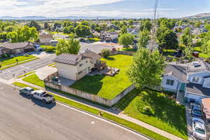 Aerial view of residential area with a mountainous background