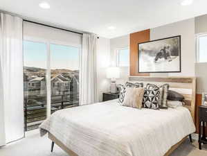 Bedroom featuring carpet flooring, access to outside, and recessed lighting