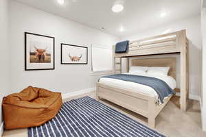 Bedroom with carpet flooring and recessed lighting