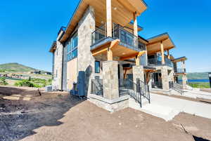 View of property with a mountain view