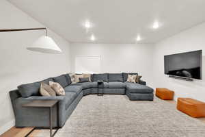 Living area featuring recessed lighting and wood finished floors