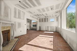 Unfurnished living room featuring a fireplace