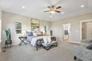 Bedroom with light carpet, recessed lighting, and a ceiling fan