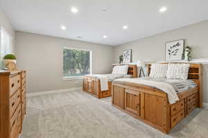 Bedroom featuring recessed lighting and light colored carpet