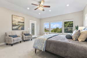 Bedroom with access to exterior, recessed lighting, ceiling fan, and light carpet