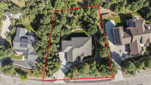 Aerial view of property and surrounding area with property parcel outlined