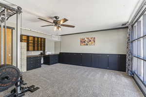 Unfurnished office with carpet floors and ceiling fan