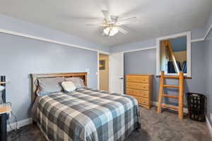 Bedroom featuring carpet floors and a ceiling fan