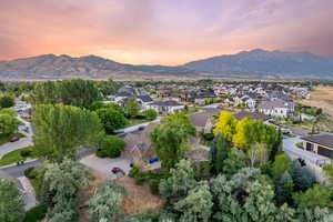 View of property location with nearby suburban area and mountains