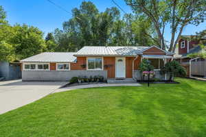 Updated Spacious 1 Level Living - 3 Bedroom / 2 Full Bath home with fun Open Space Park Like front yard and private backyard featuring workshop, shade trees, vegetable and flower gardens.