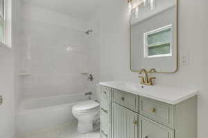 2nd Full bathroom featuring new flooring, custom cabinetry, new sink, faucets, toilet, vanity, toilet and full bathtub/shower.