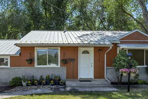 Updated Spacious 3 Bedroom / 2 Bath Rambler featuring entirely new kitchen including custom cabinetry, Quartz Stone Counters, stainless steel appliances (5-burner gas range, side-by-side refrigerator/freezer, dishwasher, microwave), large concrete drivewa