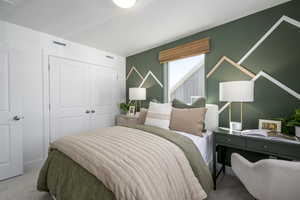 Bedroom with carpet flooring and a closet