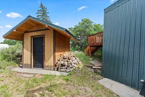 View of shed featuring stairs