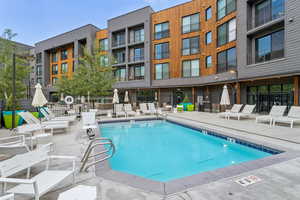 Community pool featuring a patio area