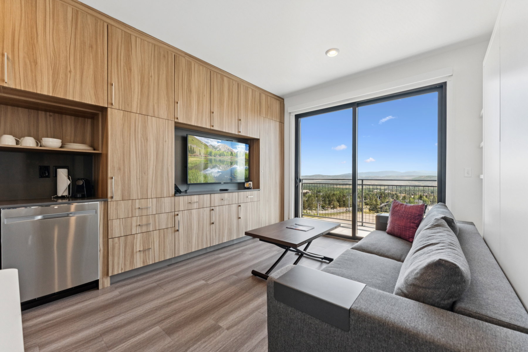 Living area featuring light wood-style flooring