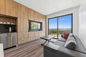 Living area featuring light wood-style flooring