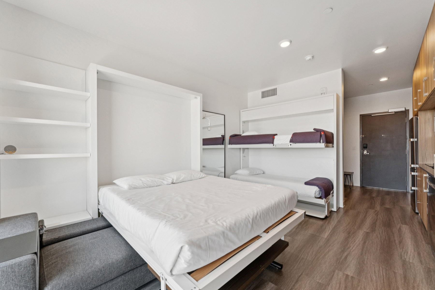Bedroom featuring dark wood-type flooring and recessed lighting