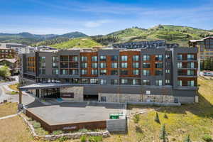 View of property with a mountain view