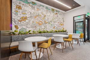 Dining area featuring ornamental molding