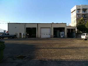 View of property with a garage
