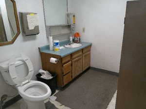 Bathroom with toilet and vanity