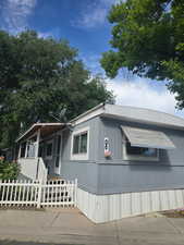 Manufactured / mobile home featuring covered porch