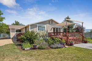 View of front of home with a deck