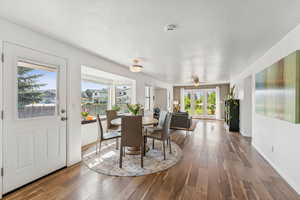 Dining room featuring hardwood / wood-style floors and ceiling fan