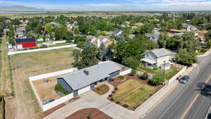 Aerial view of residential area featuring a mountain backdrop