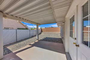 Fenced backyard featuring a patio area
