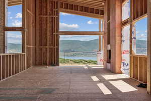 Misc room featuring a water and mountain view
